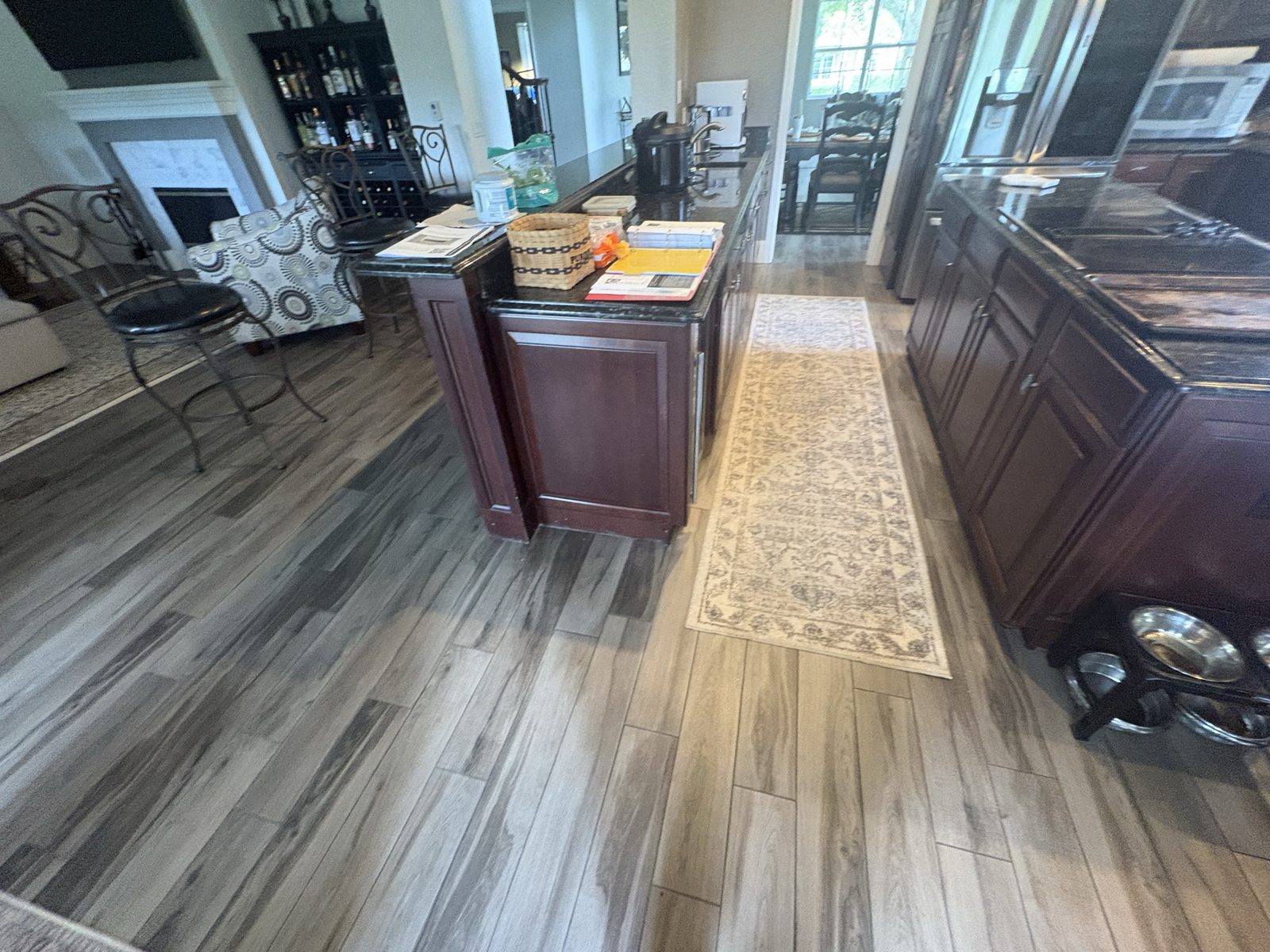 Before: dark cherry island and kitchen